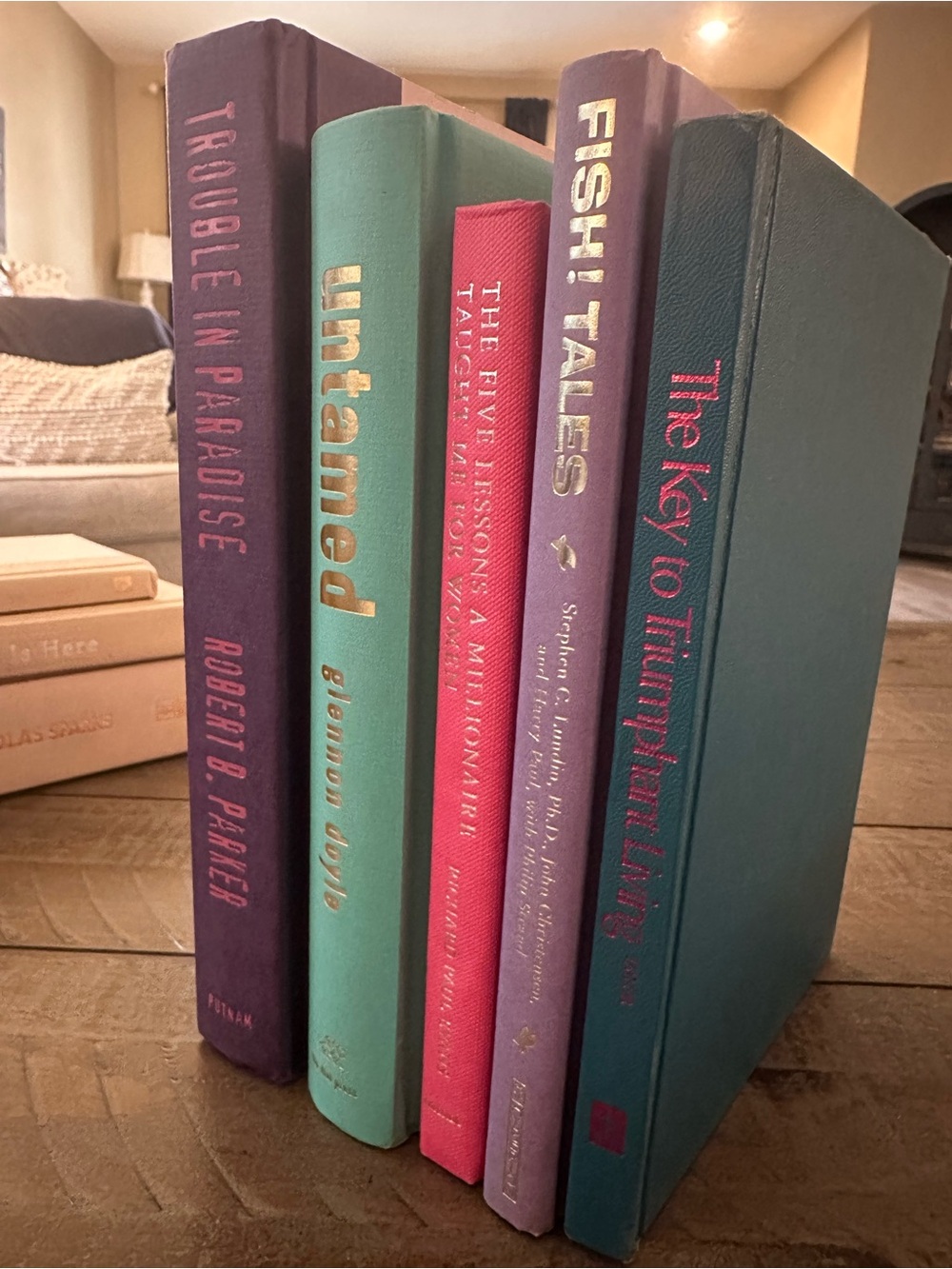 Five hardback bright colored books pink purple turquoise aesthetic decor staging